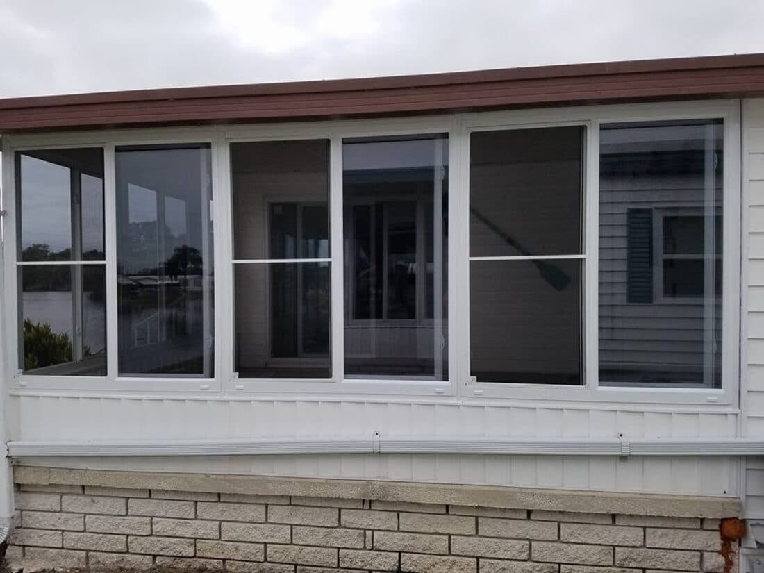Aluminum Florida room and window upgrades on a manufactured home